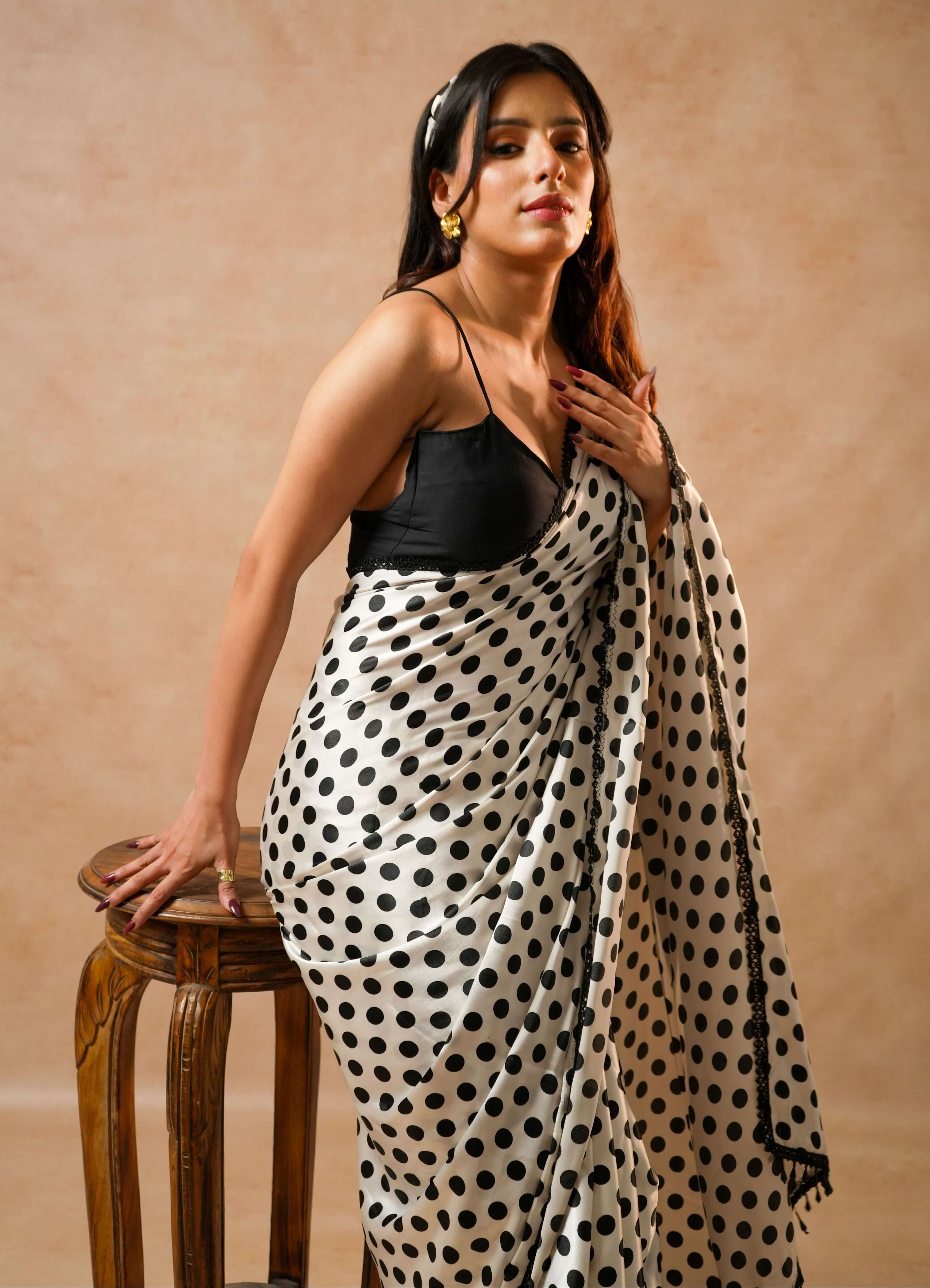 Naomi Designer Polka Dot Satin Saree with Crystal Lace elegantly draped on a model, showcasing playful sophistication.